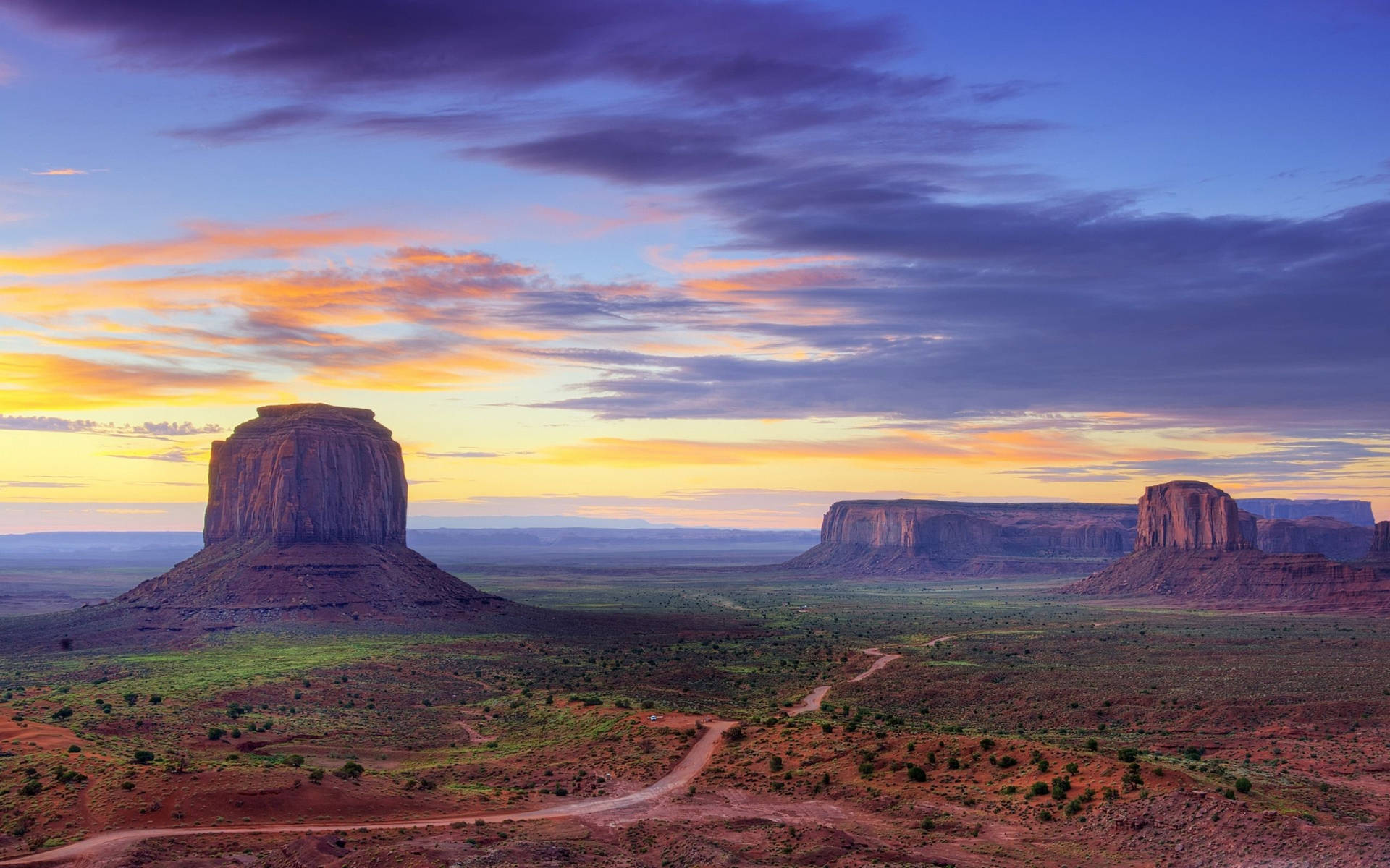 Purple Sky At Monument Valley Background