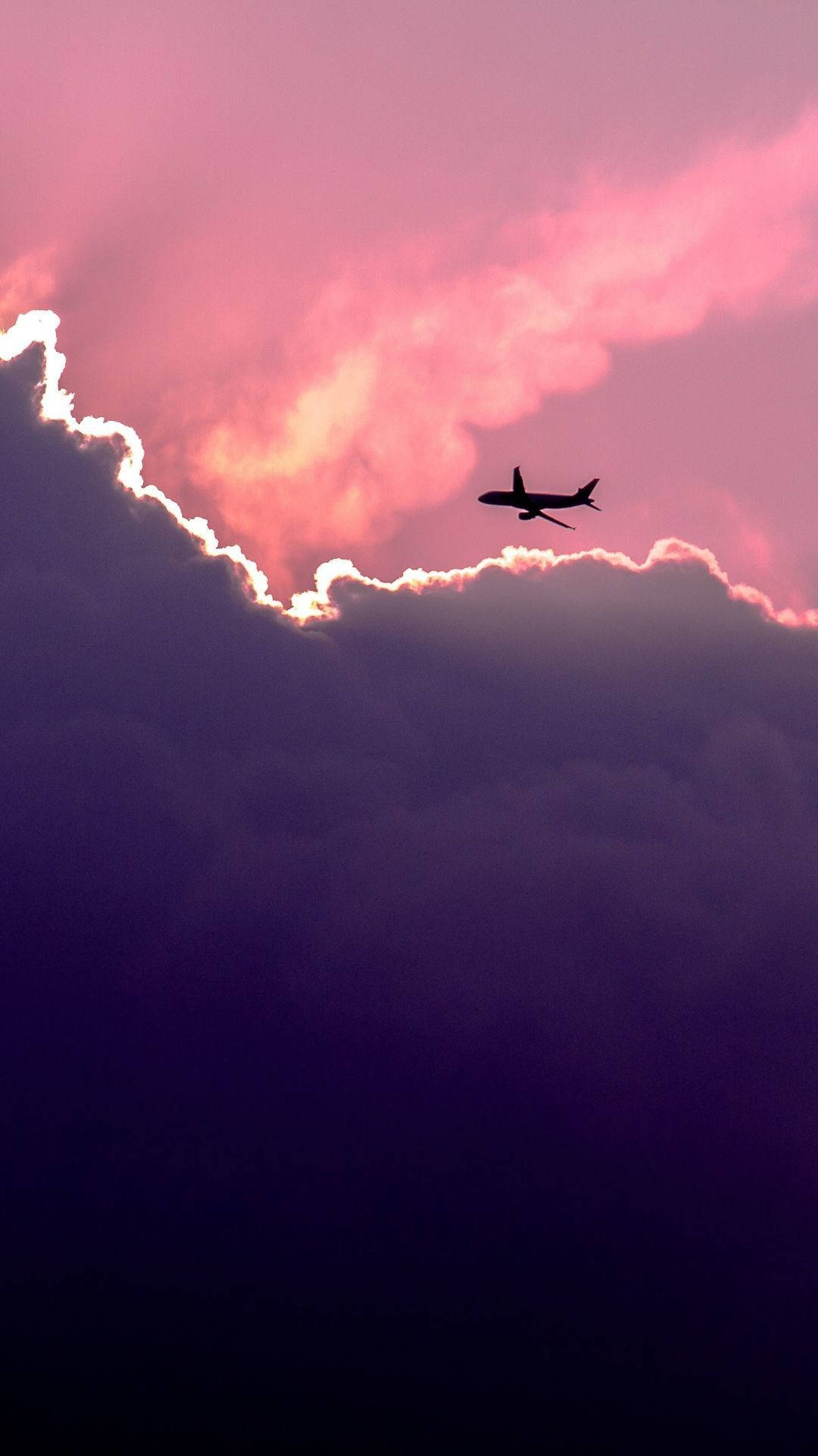 Purple Sky With Flying Airplane Android Background