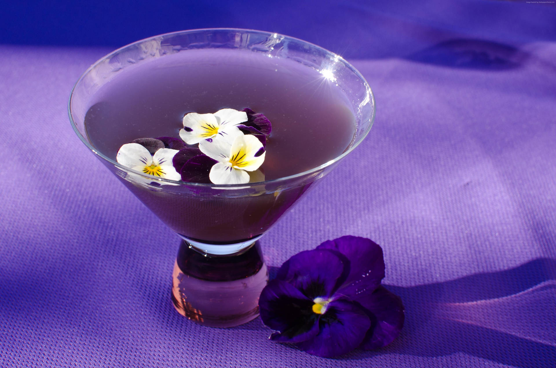 Purple Tequila Cocktail With Flowers