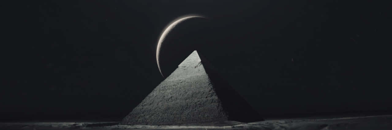 Pyramid Of The Moon Dark Background