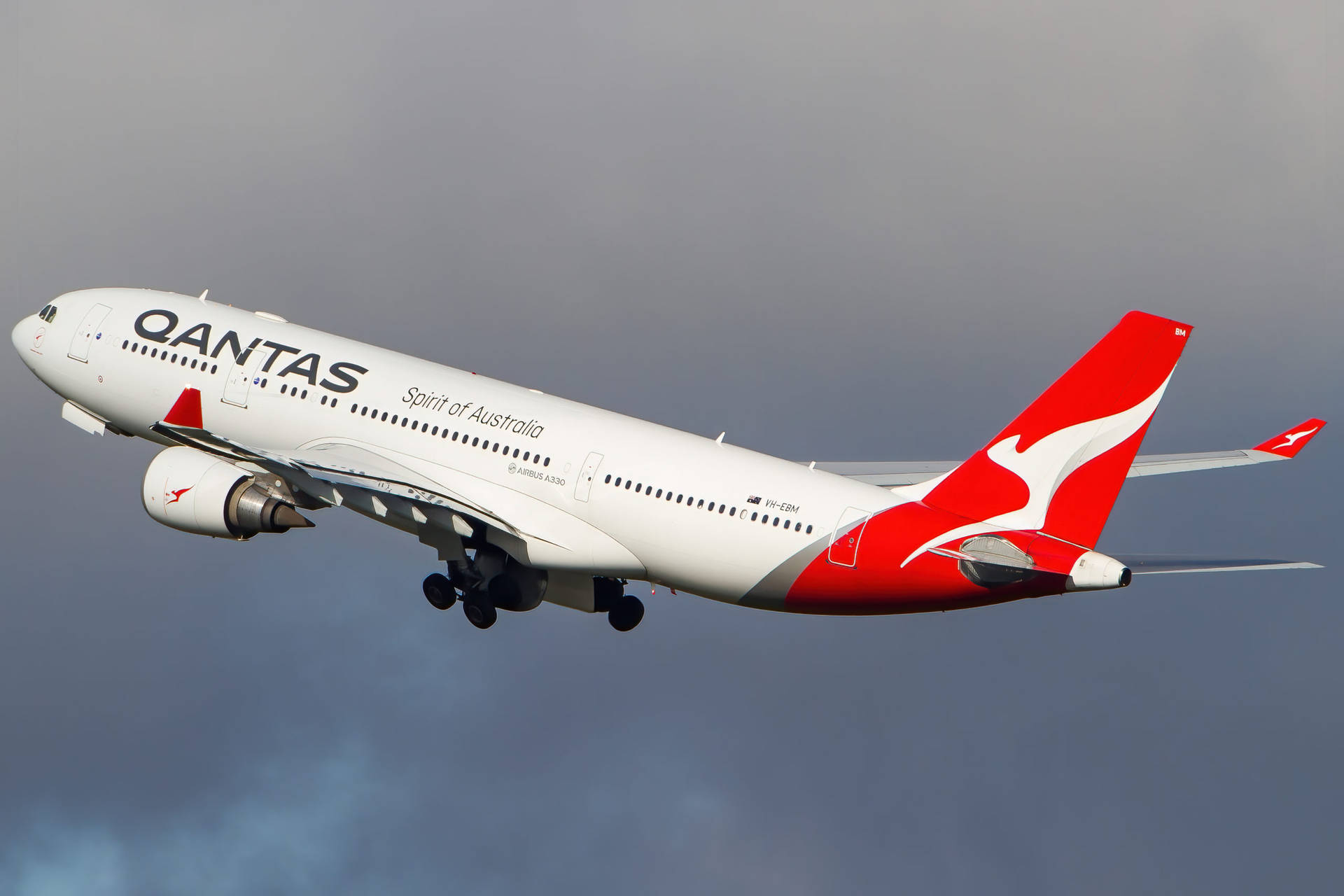 Qantas Airbus Under The Dark Sky Background