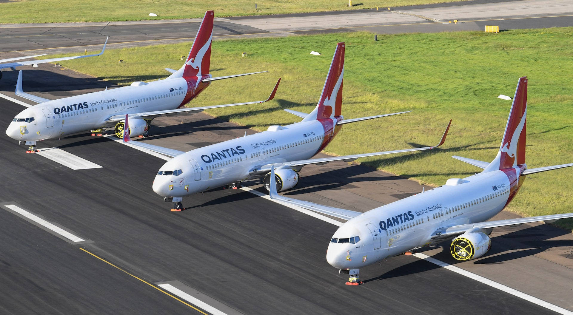 Qantas Aircrafts At The Airport Background