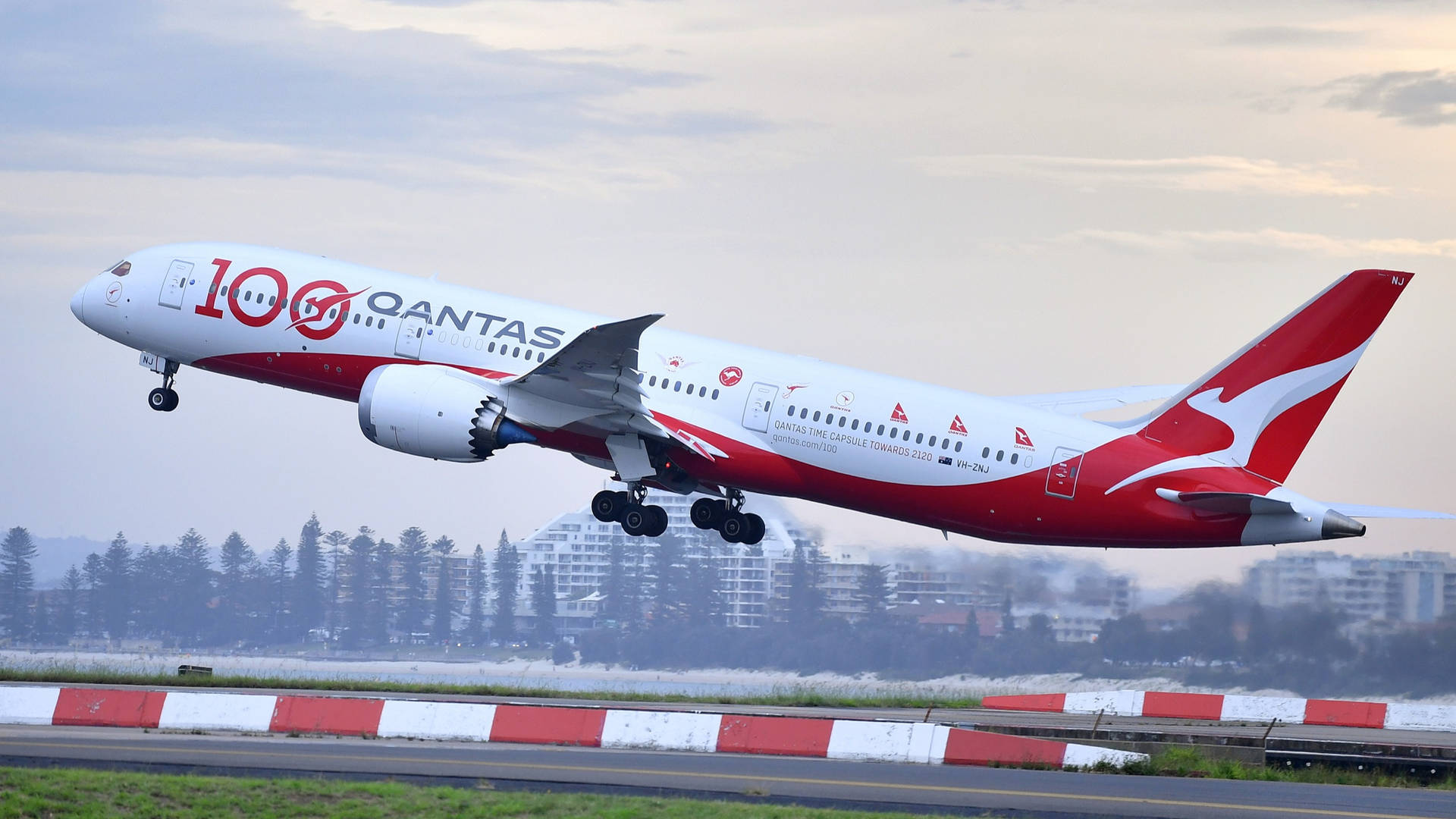 Qantas Airplane On A Take Off Background