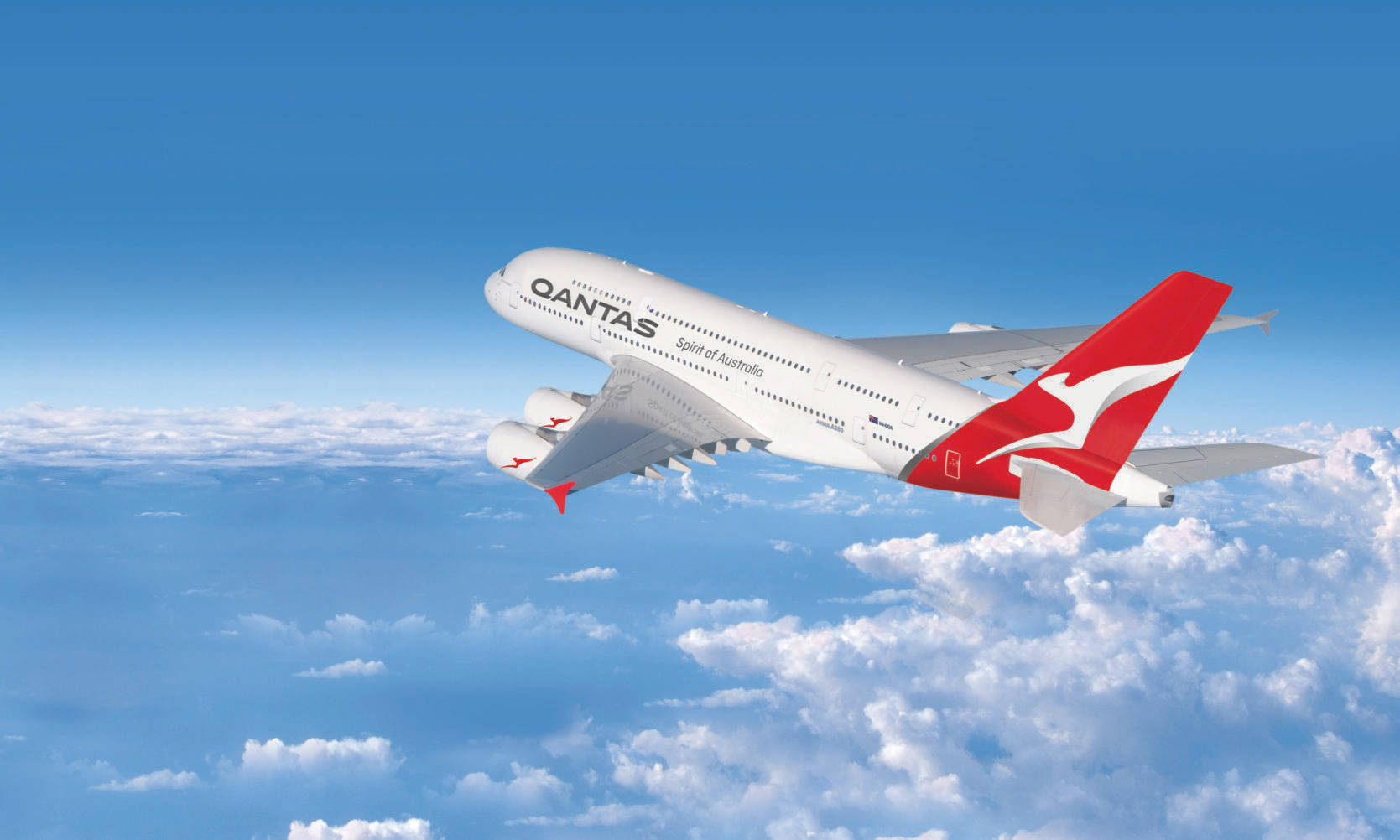 Qantas Airways Passenger Airplane In The Blue Sky