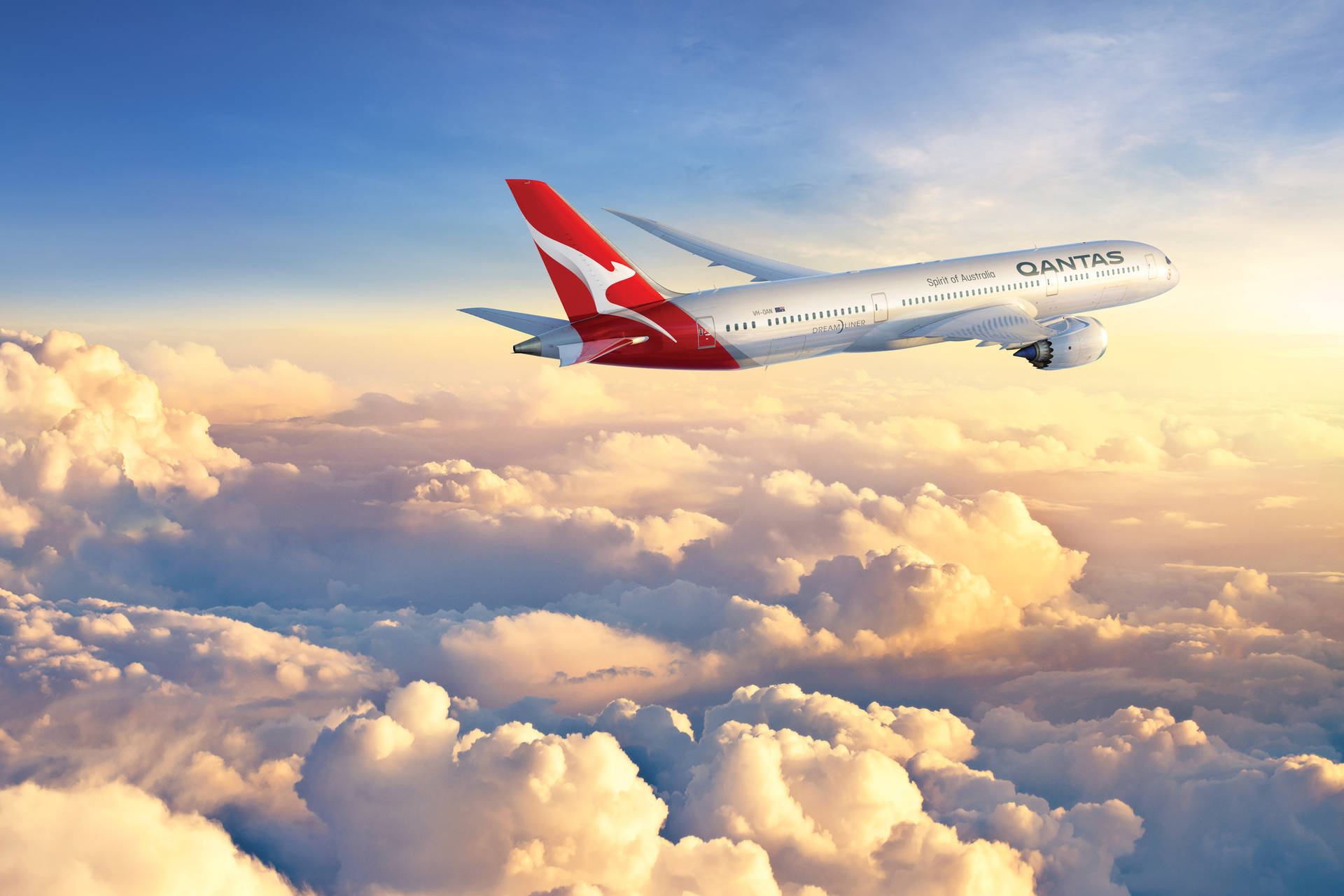 Qantas Airways Plane Above The Clouds Background