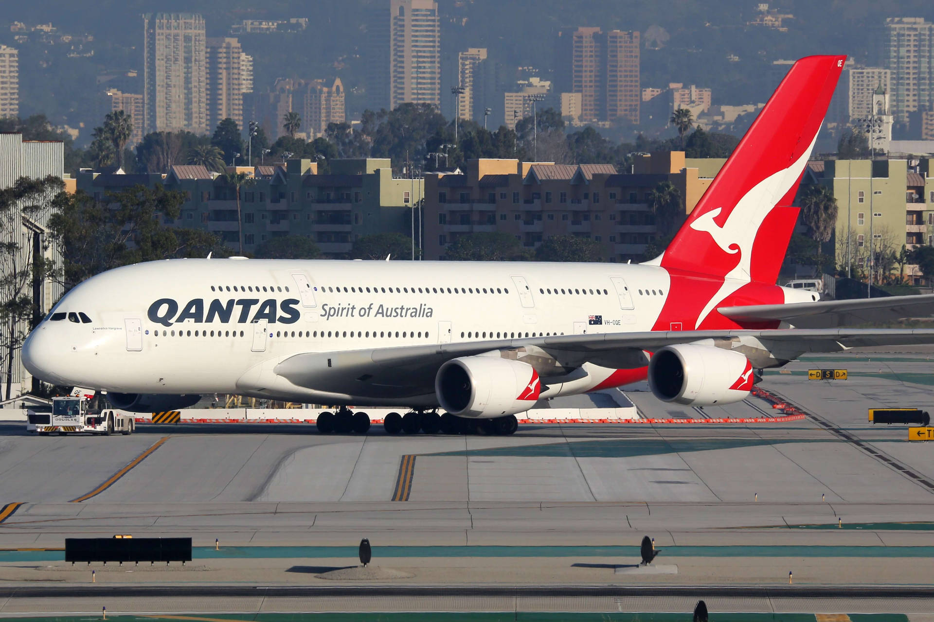 Qantas Big Airbus A380 On Airport Ground Background