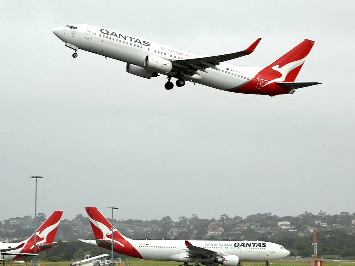 Qantas Boeing 737 Aircrafts At The Airport Background