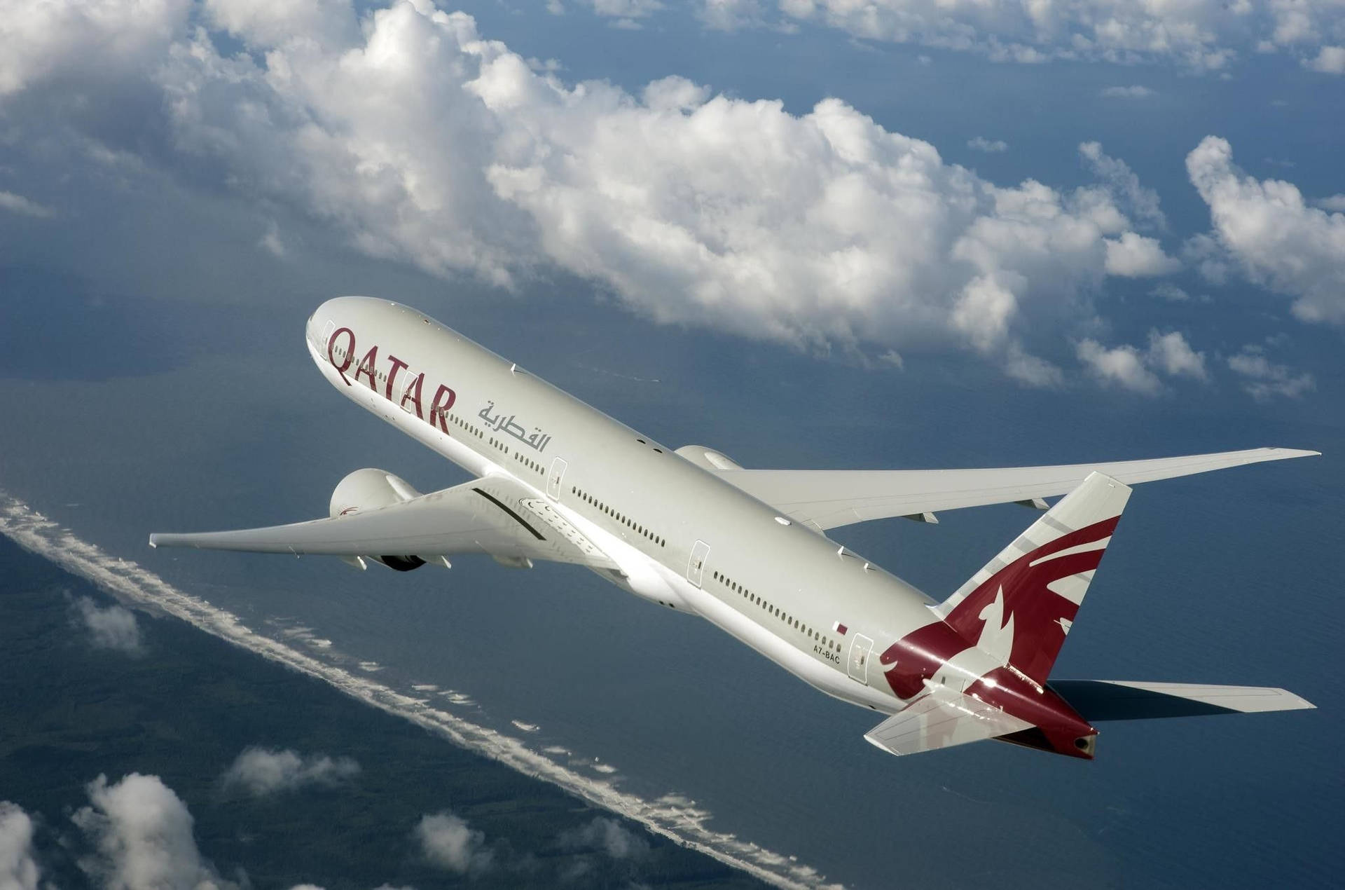 Qatar Airways Flying Into The Feathery Clouds Background