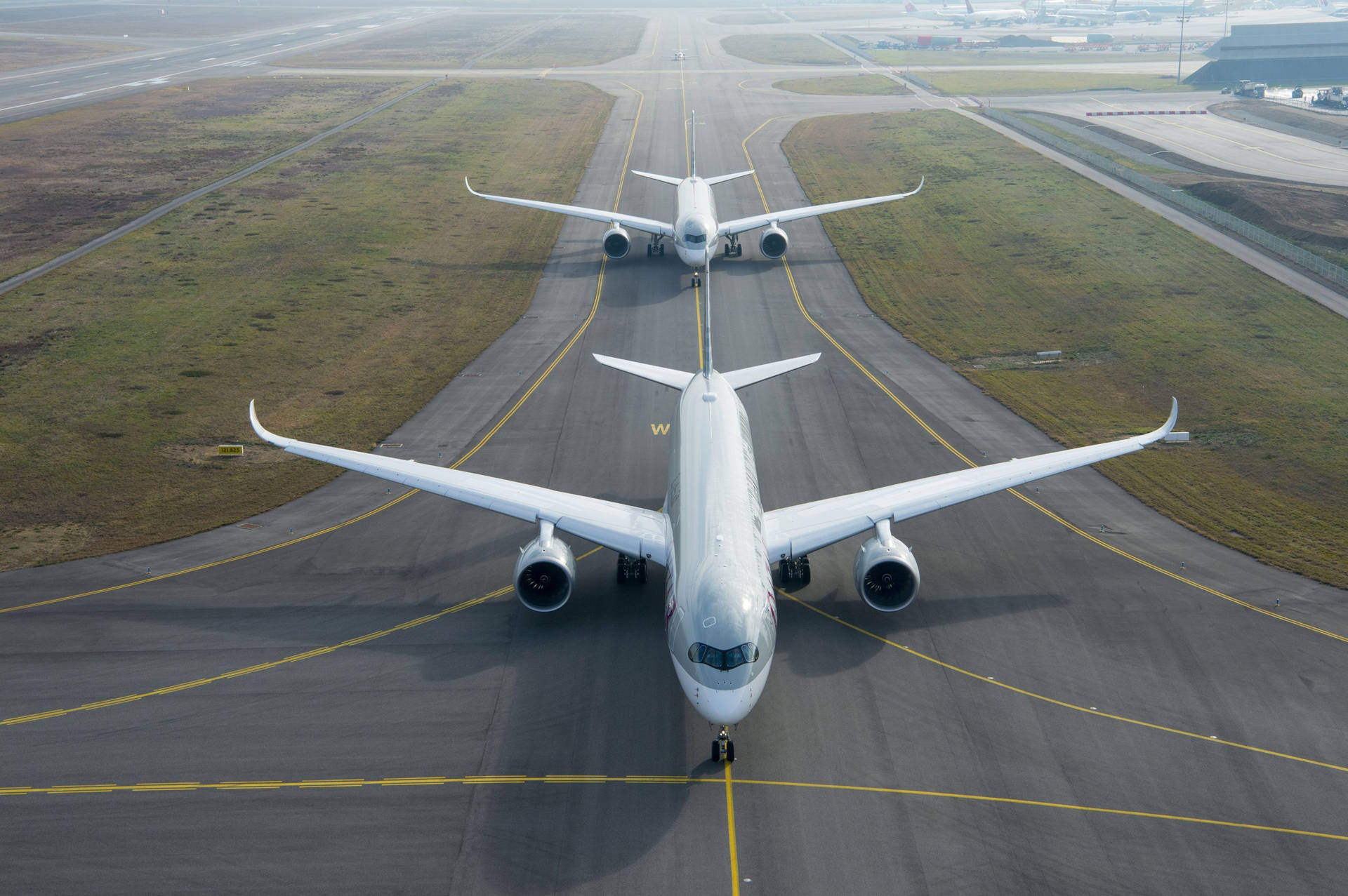 Qatar Airways In A Queue In Runway