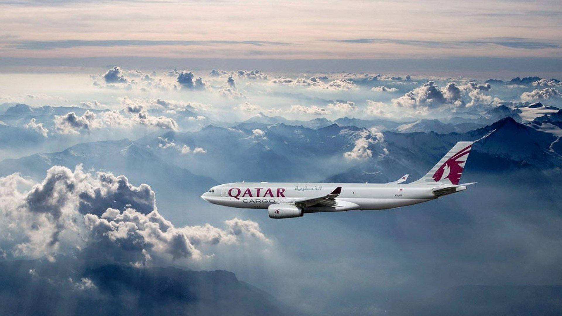 Qatar Airways Plane Blue Sky Background