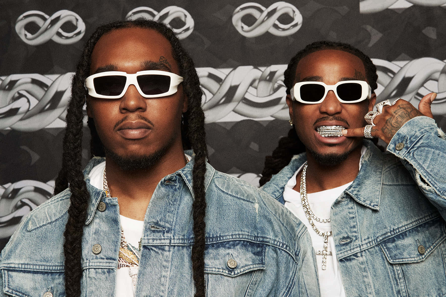 Quavo Huncho In A Swag Pose Background