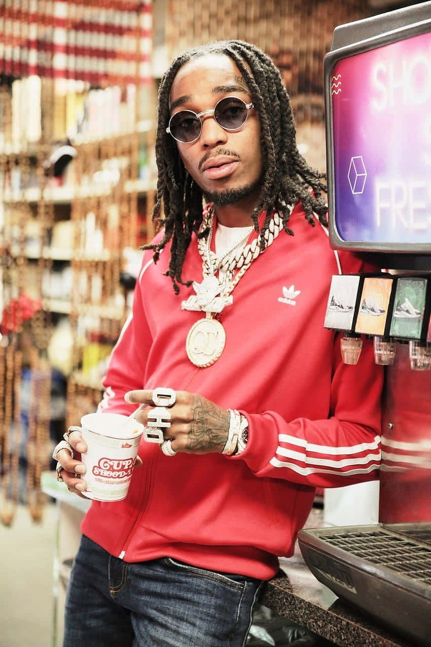 Quavo Huncho Showcasing His Stylish Attitude Background