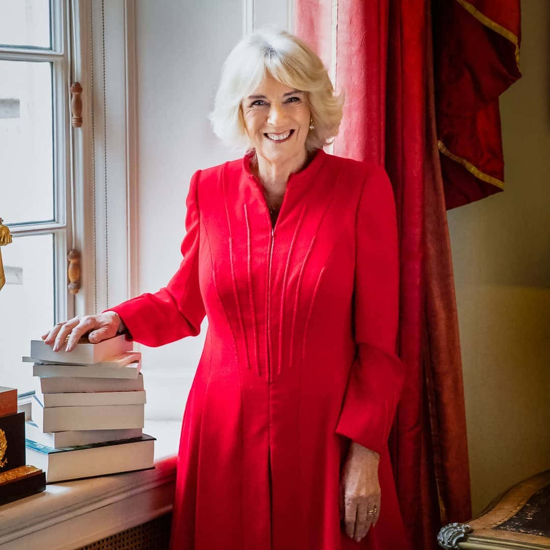 Queen Camilla In Red Dress