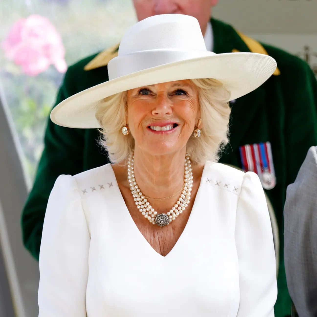 Queen Camilla In White Outfit