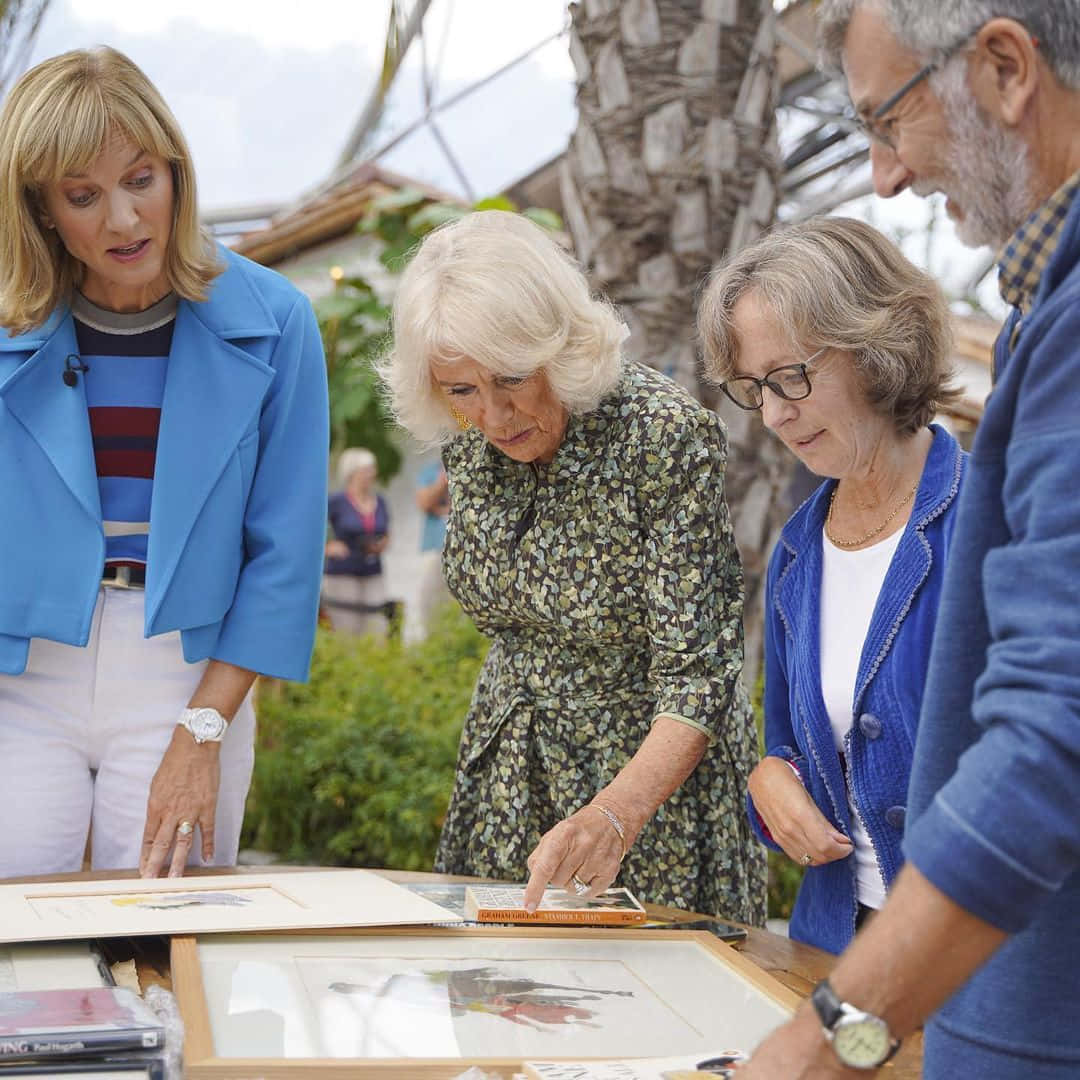 Queen Camilla Looking At Designs