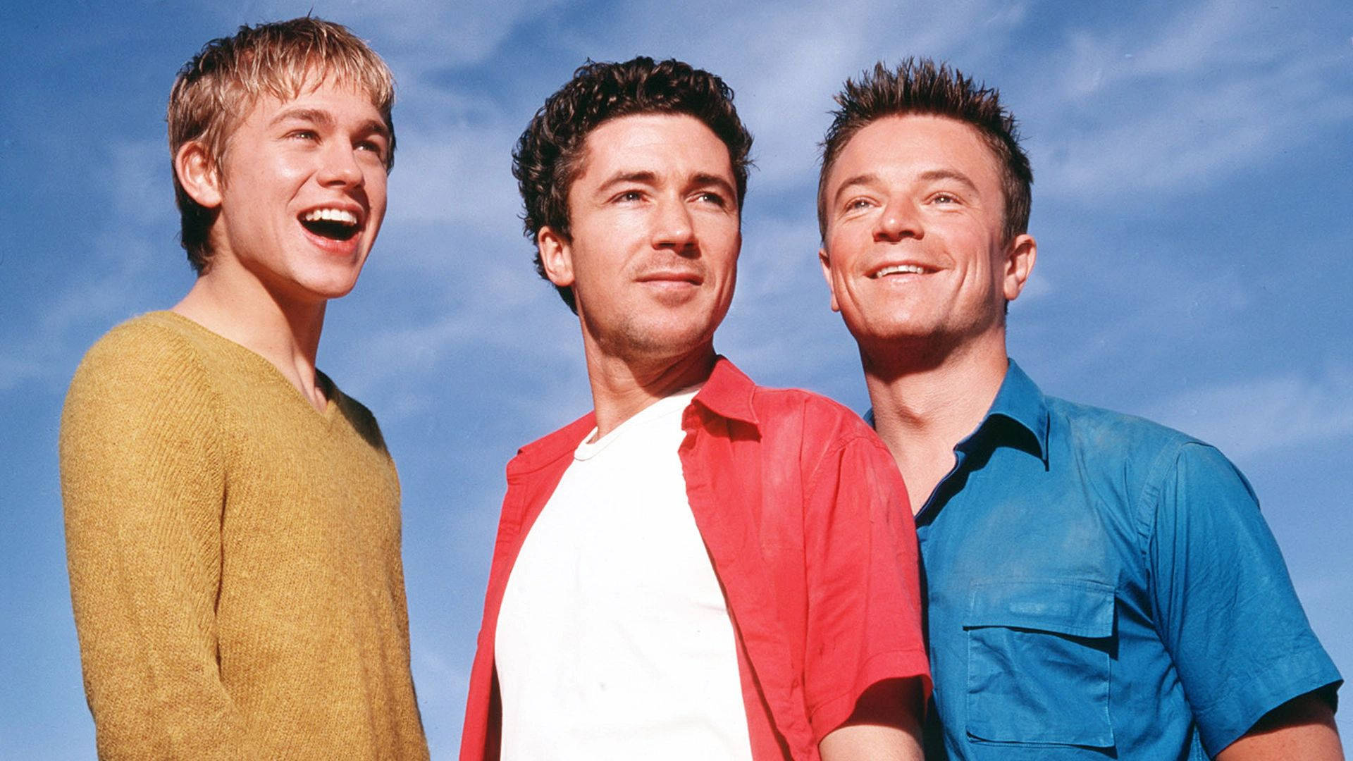 Queer As Folk Smiling Trio Background