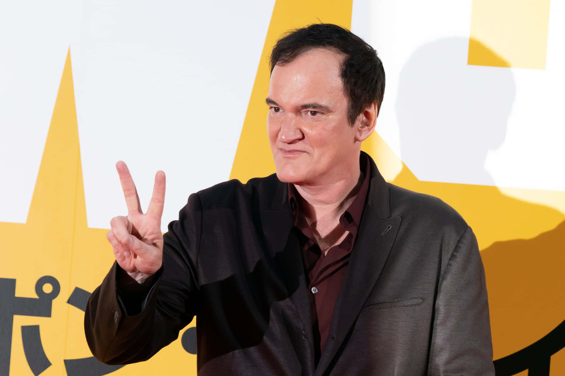 Quentin Tarantino Peace Sign Background