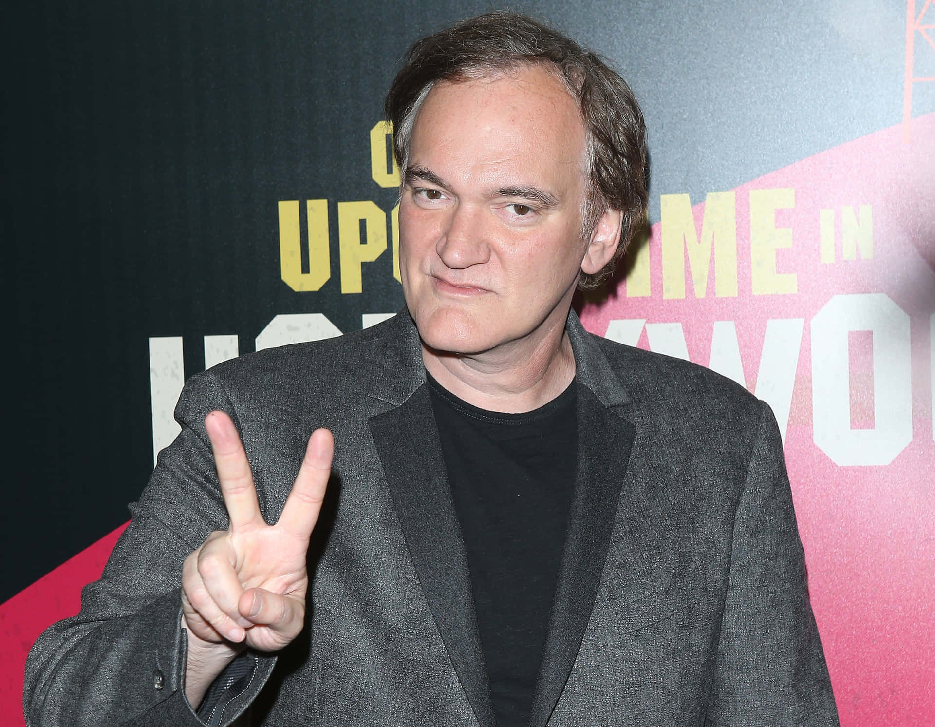 Quentin Tarantino Peace Sign Event Background