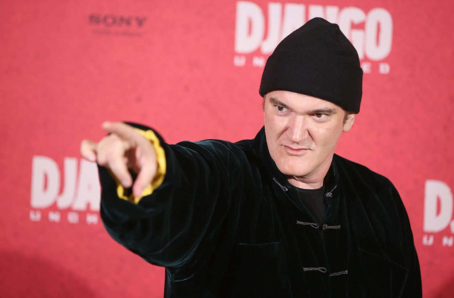 Quentin Tarantino Pointingat Event Background