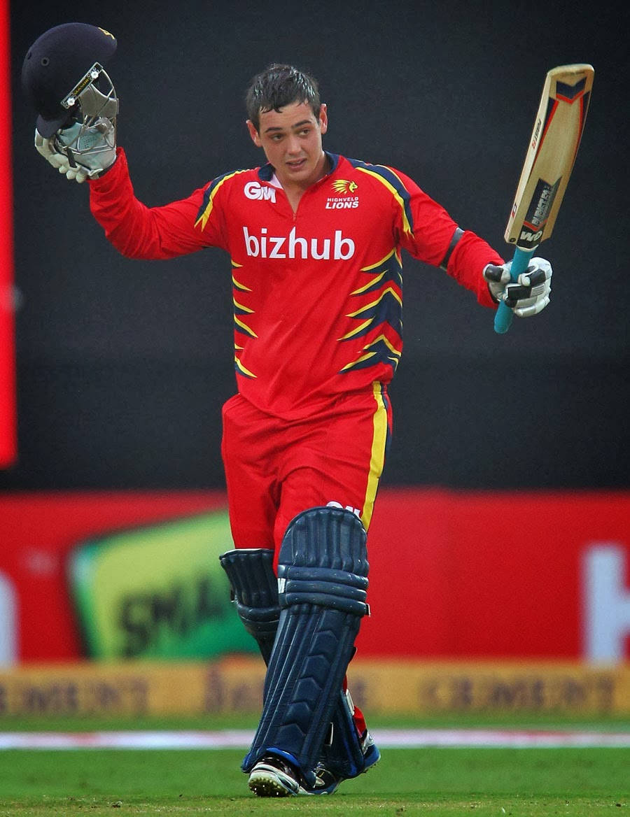 Quinton De Kock In Action In Vibrant Red Cricket Kit Background