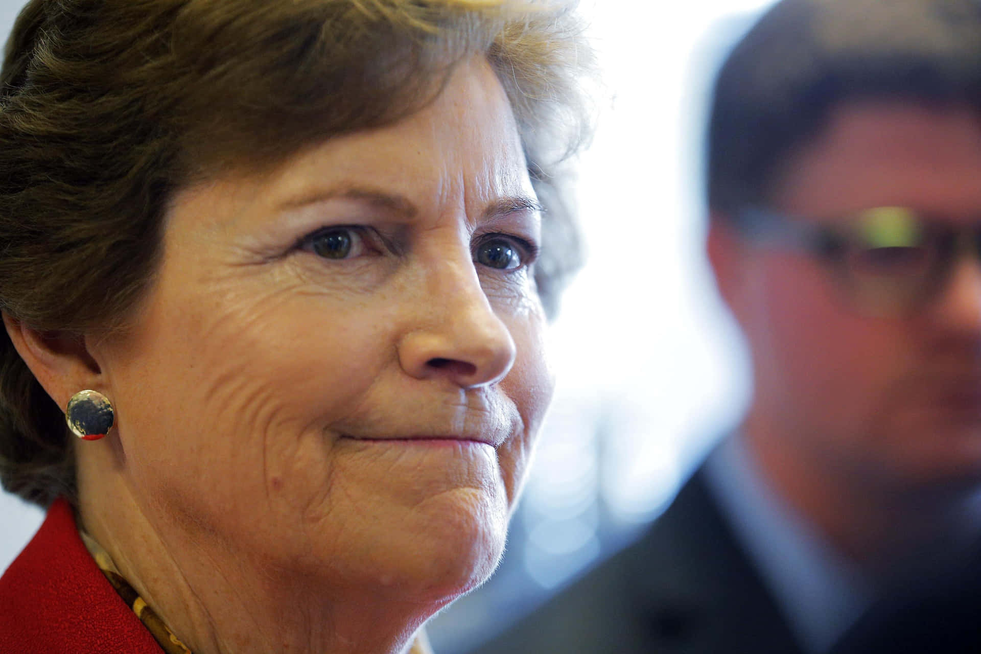 Quipped Smile Jeanne Shaheen Background