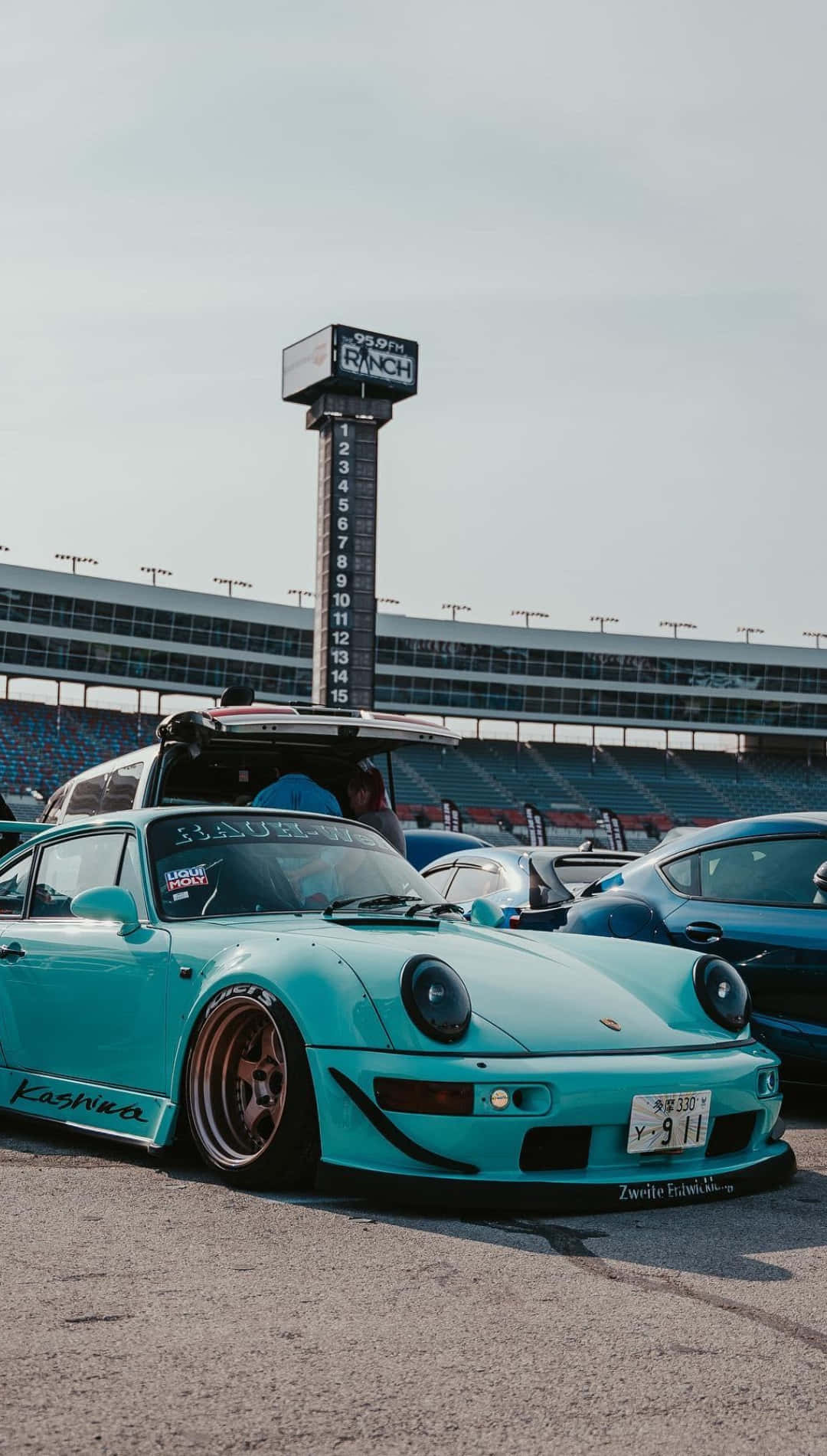 R W B Porscheat Race Track Background
