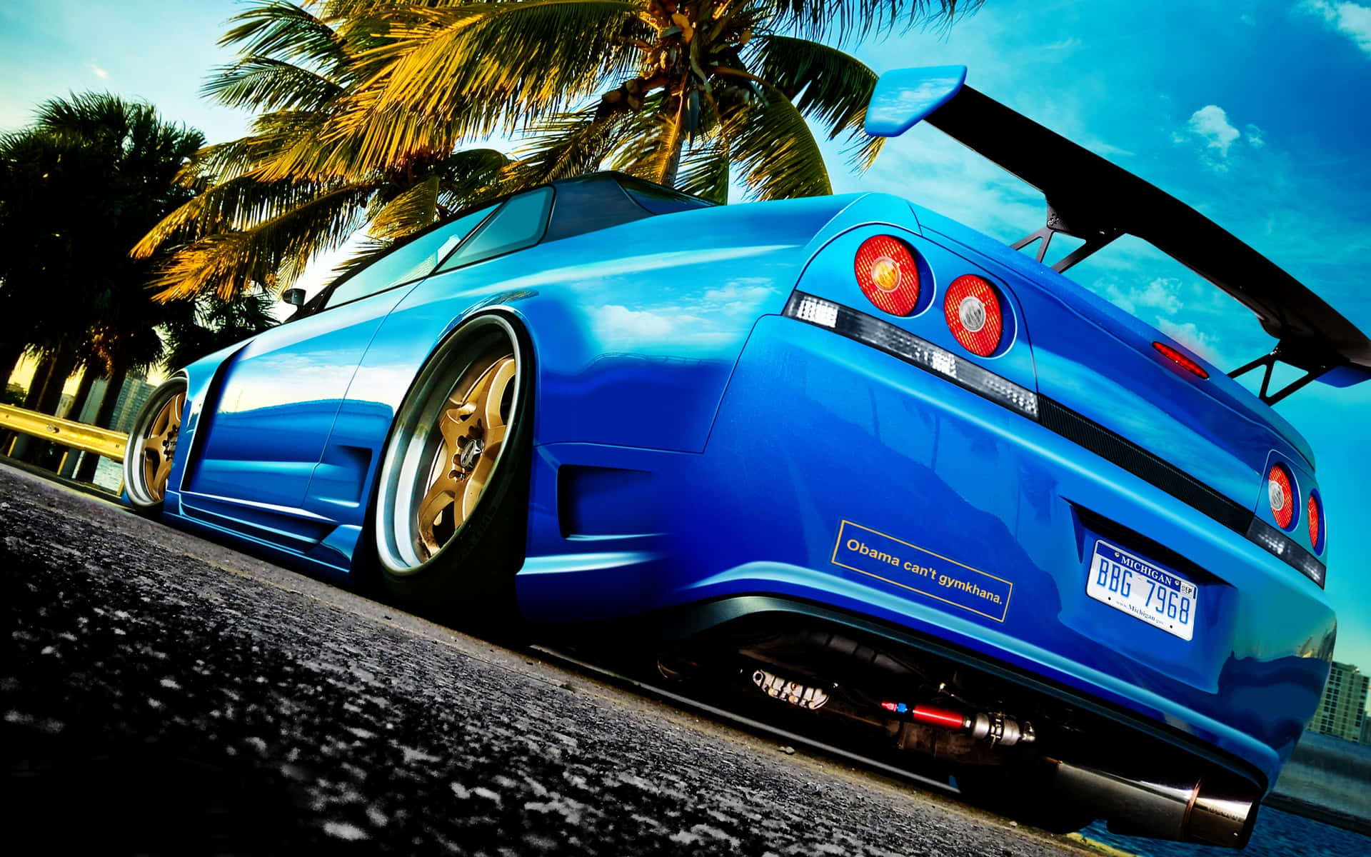 R33 Gtr Blue Low Rise Palm Trees Background