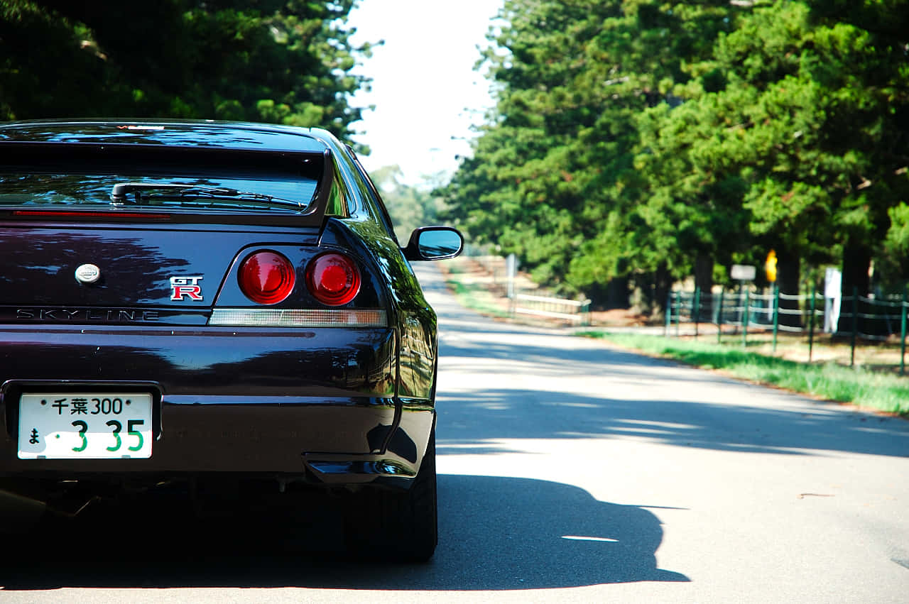 R33 Gtr Maroon Driving Background