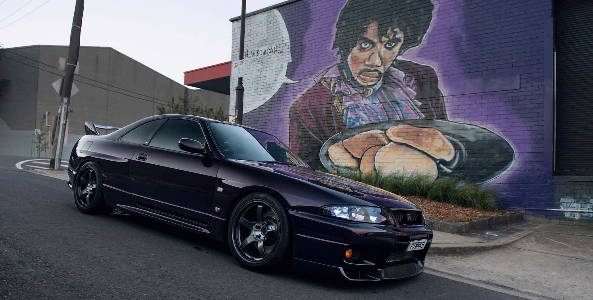 R33 Gtr Parked Prince Mural Background