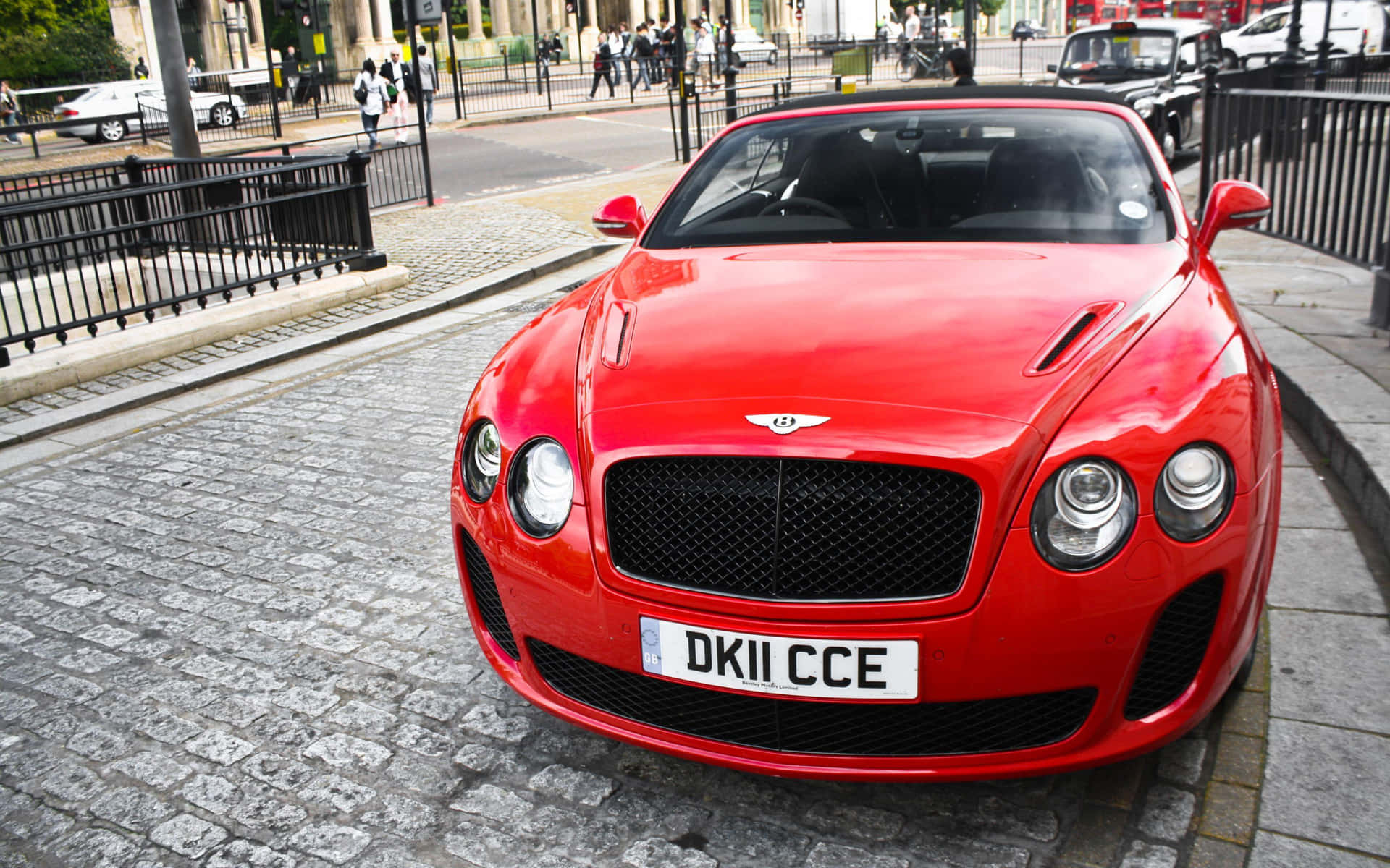 Race Ahead Of The Rest With Bentley Sport Background