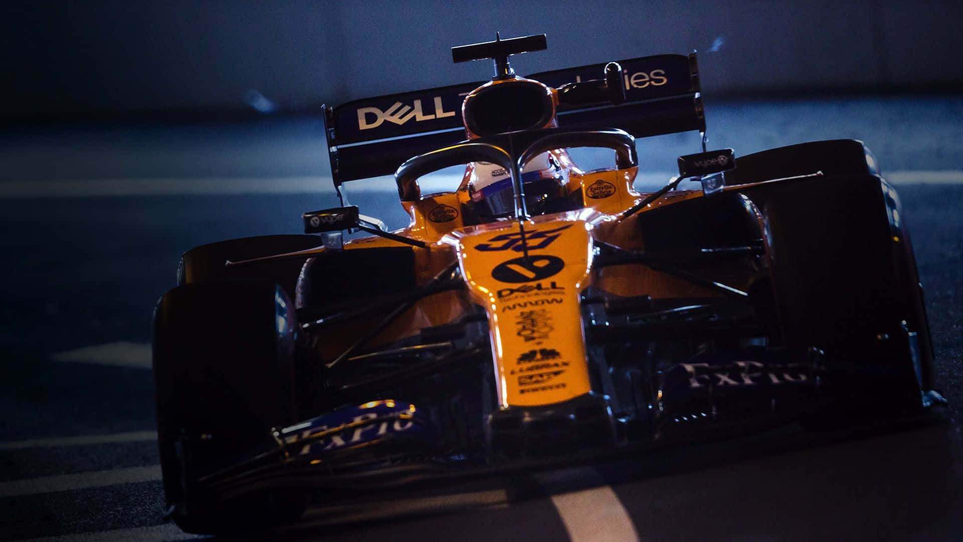 Race To Victory In The Mclaren F1 Background