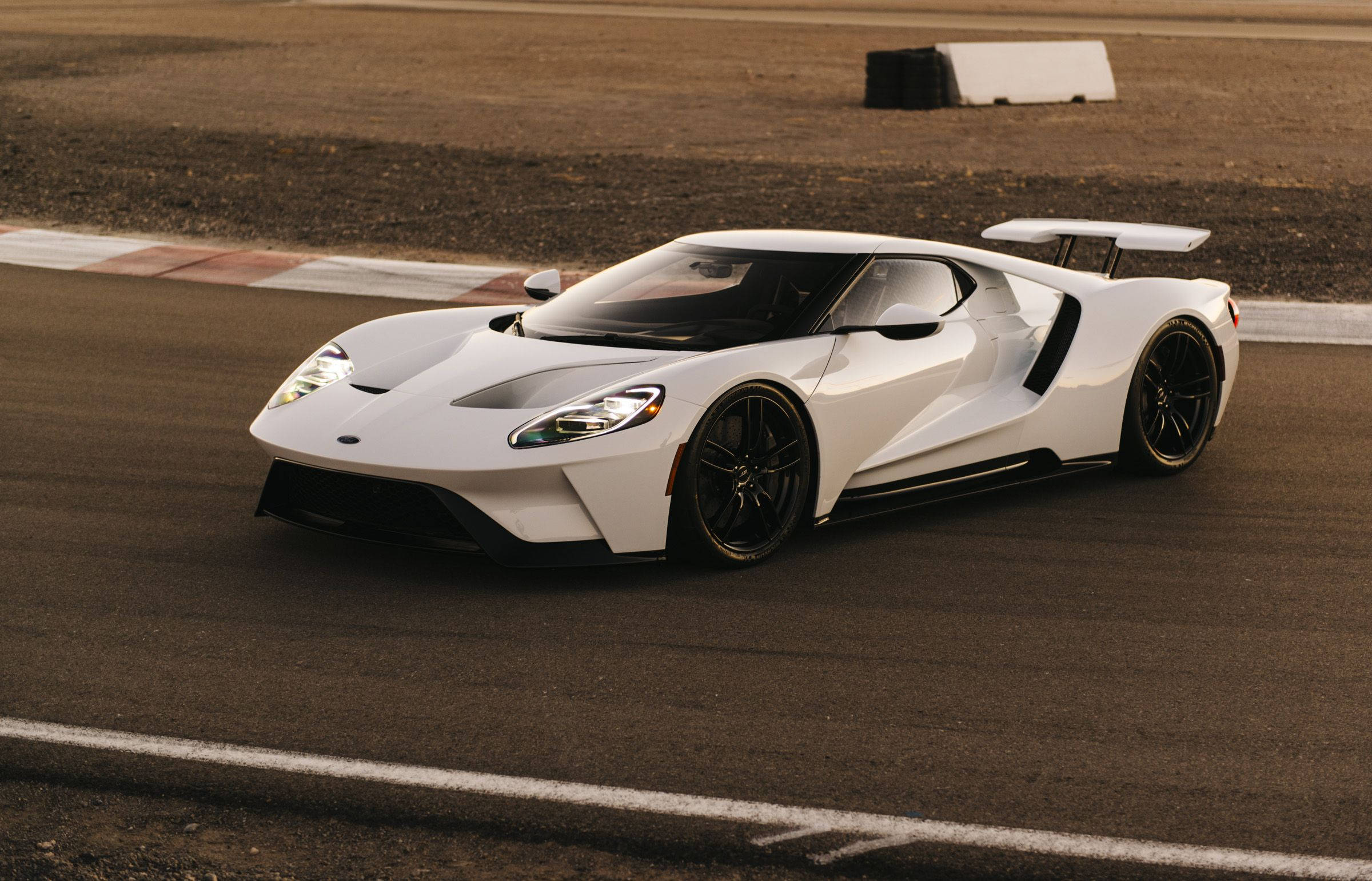 Race Track With White Ford Gt Background