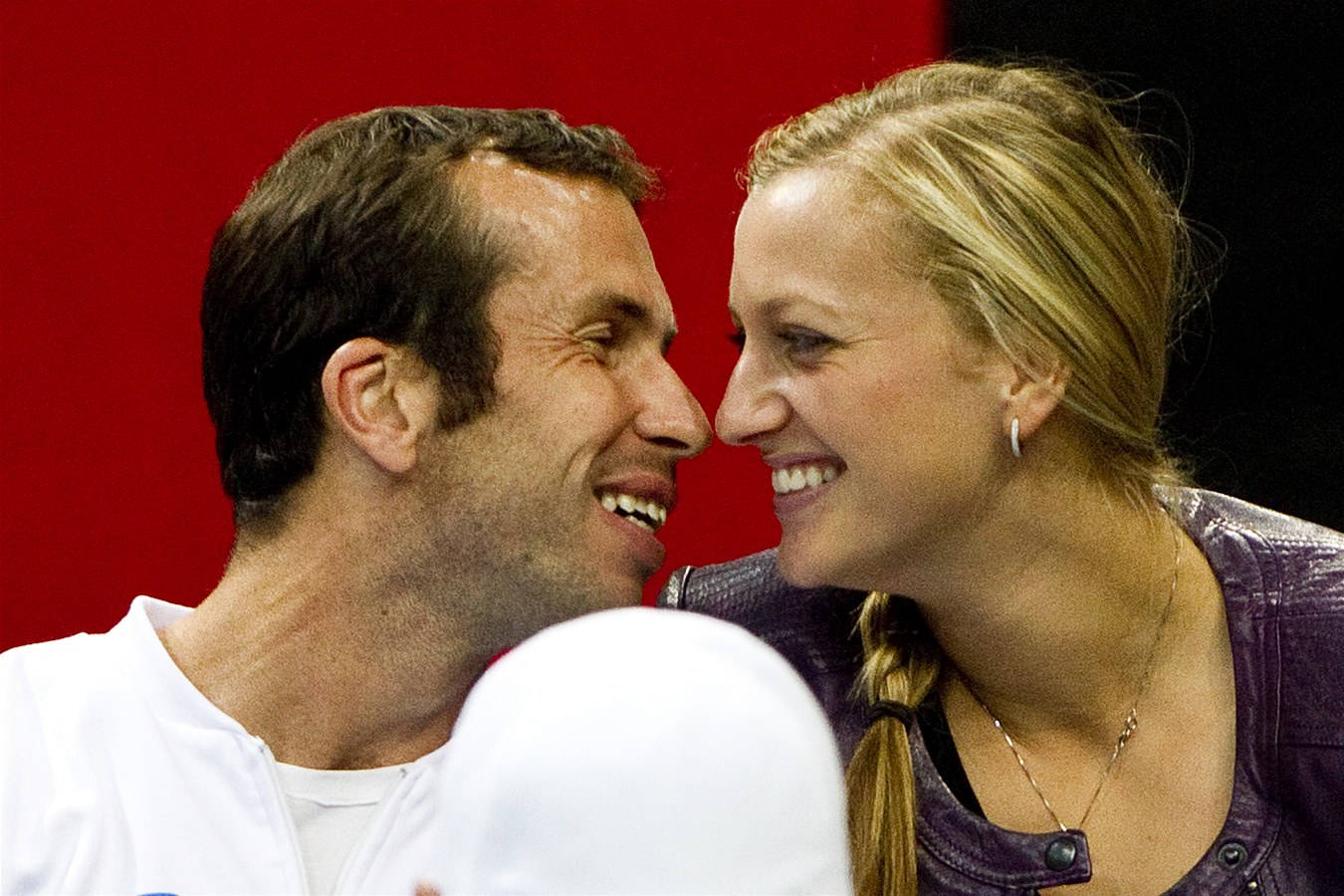 Radek Stepanek And Petra Kvitova In A Sweet Moment Background