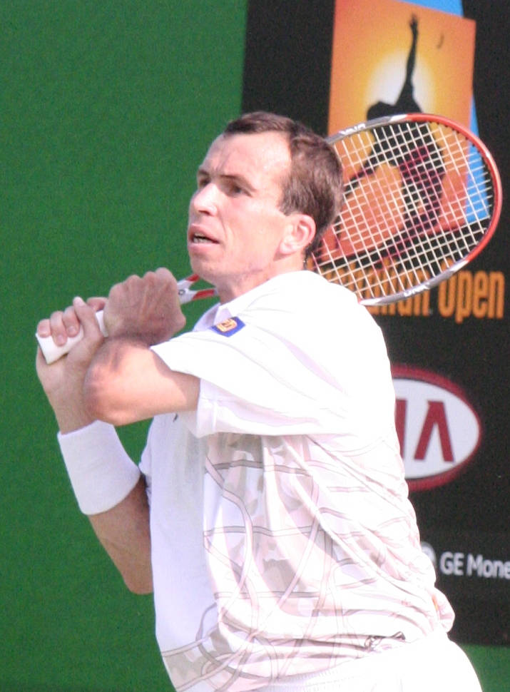 Radek Stepanek Holding Tennis Racket Over Shoulder Background