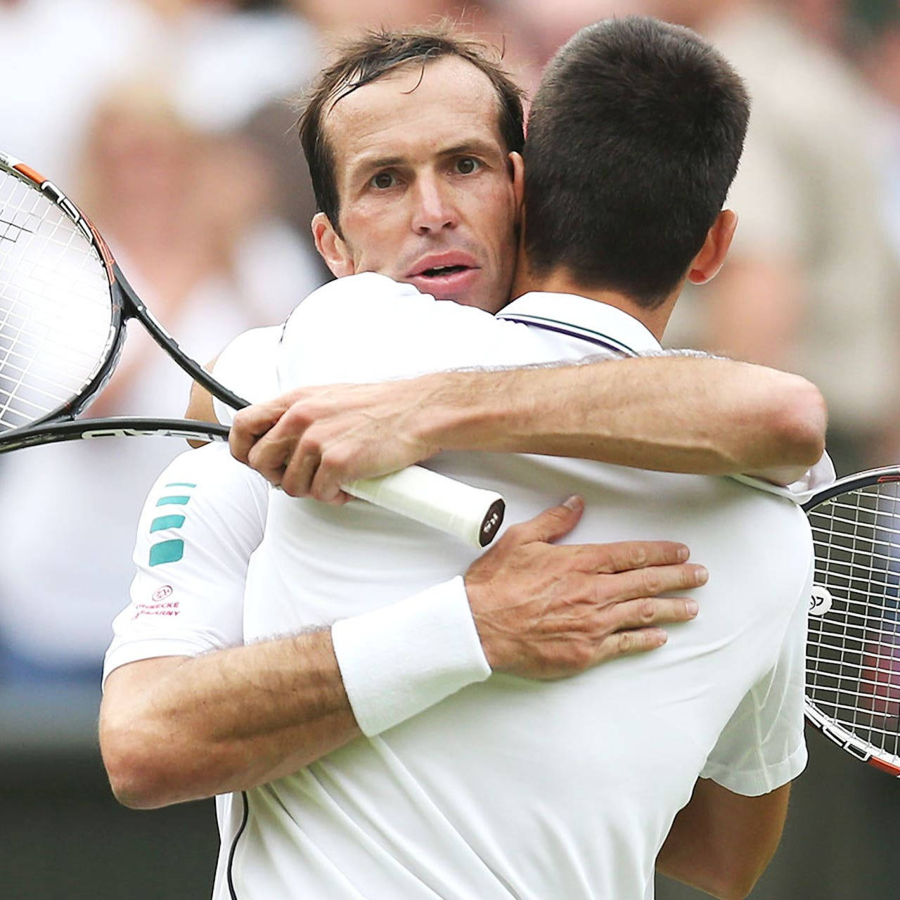 Radek Stepanek Hugging Novak Djokovic Background