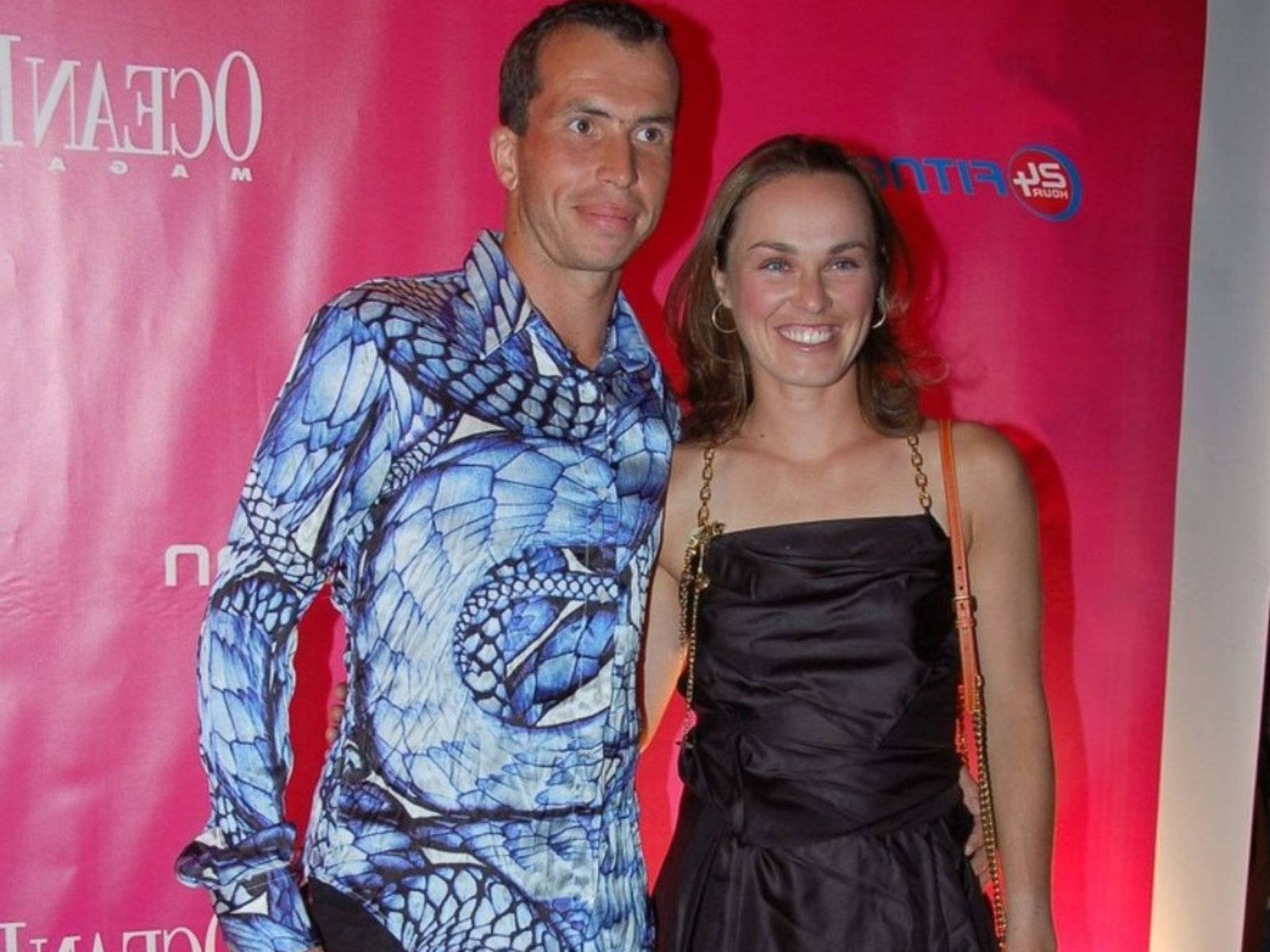 Radek Stepanek In Action Wearing A Printed Top Background