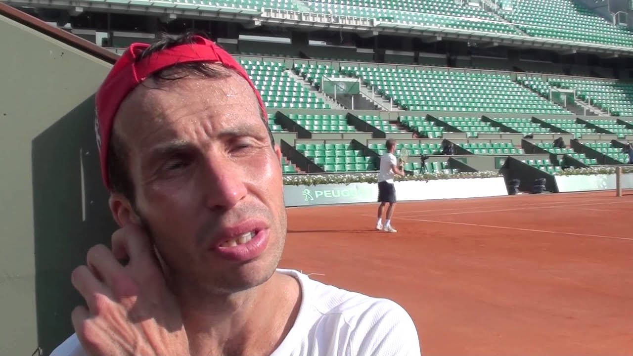 Radek Stepanek Squinting While Concentrating On The Game Background