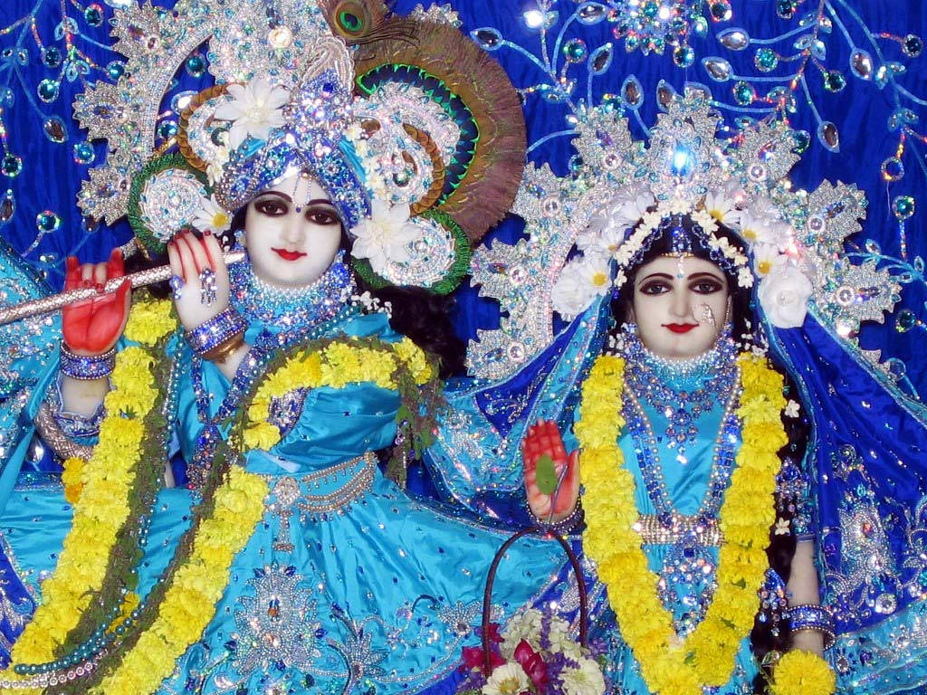 Radha And Krishna In Iskcon Temple Background