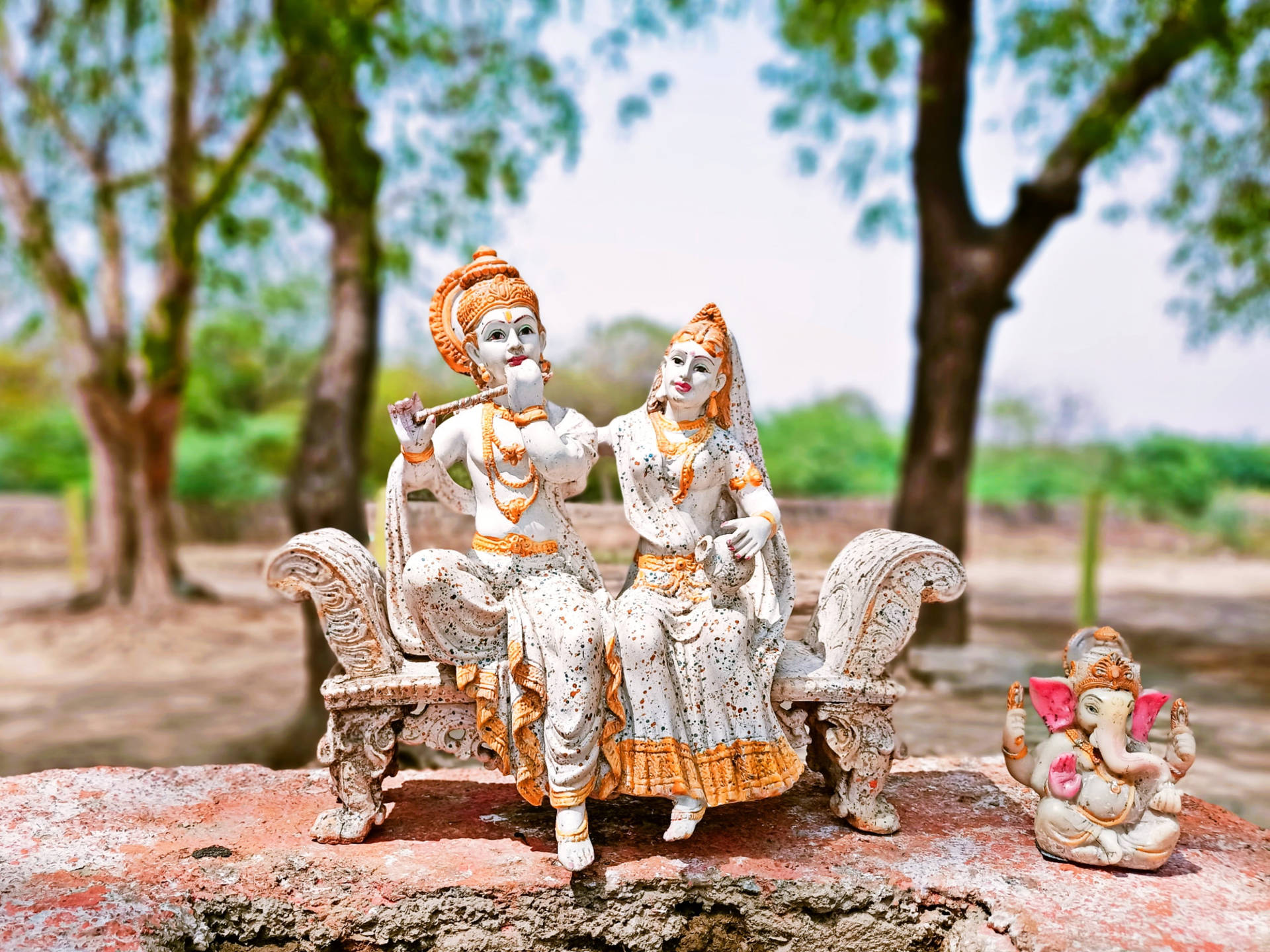 Radha Krishna 3d With Ganesha Miniature Statues Background
