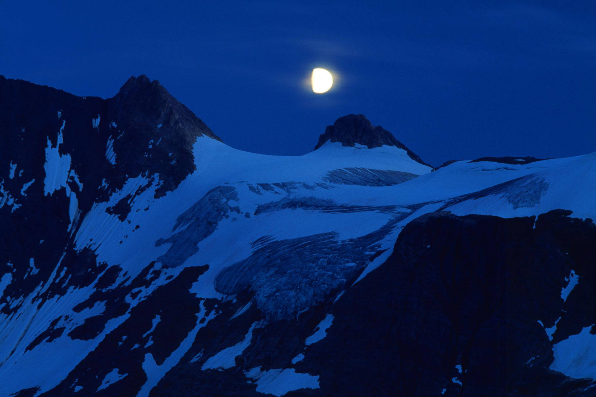 Radiant Full Moon Illuminating The Night Sky Background