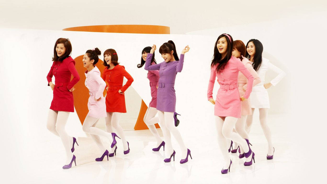 Radiant Ladies Of Girls' Generation In Vibrant Dresses. Background
