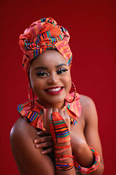 Radiant Nigerian Woman Adorned In Colorful Ornaments