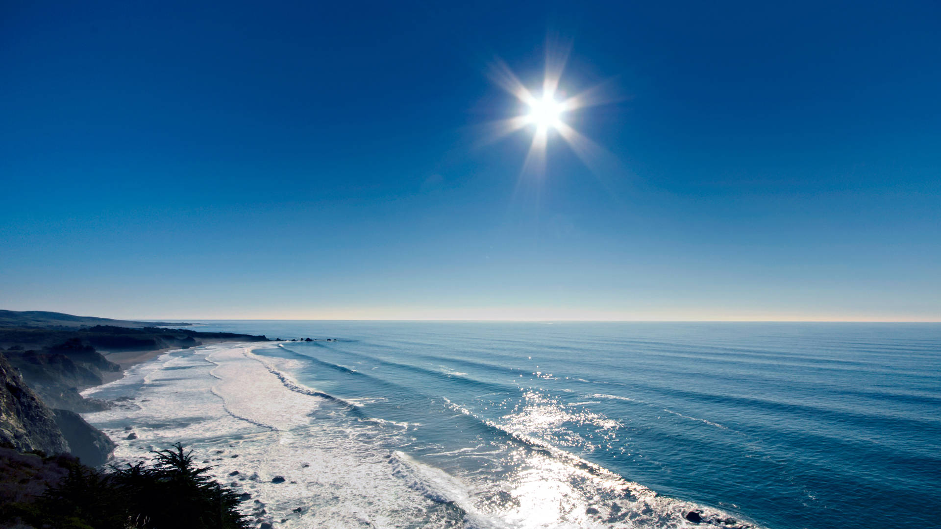 Radiant Sun Ocean View Background