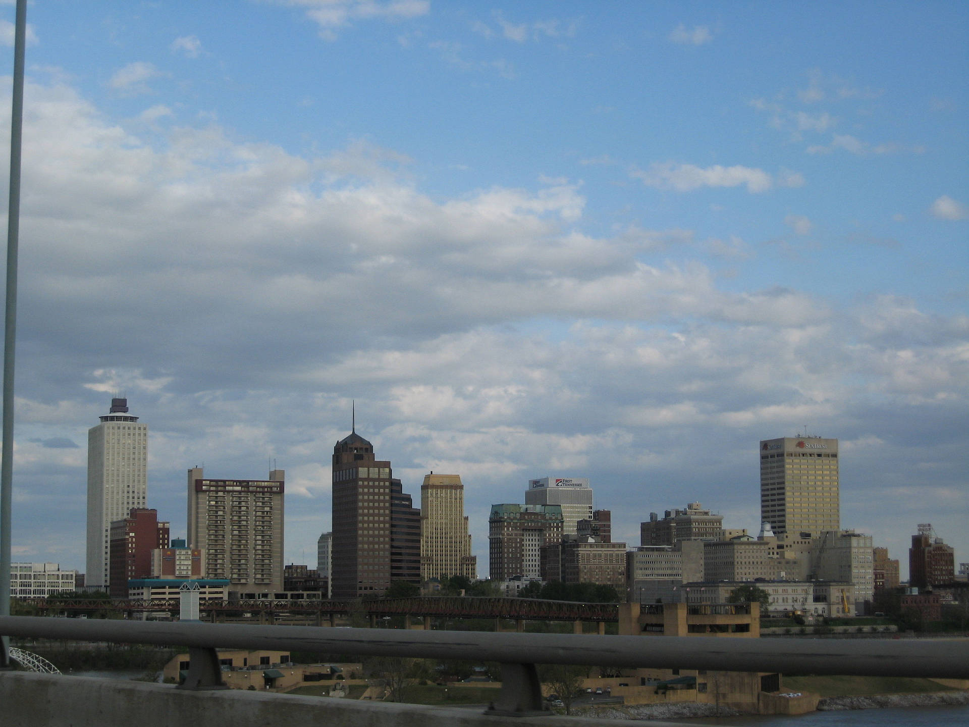 Radiant Sunset Over Downtown Memphis Background