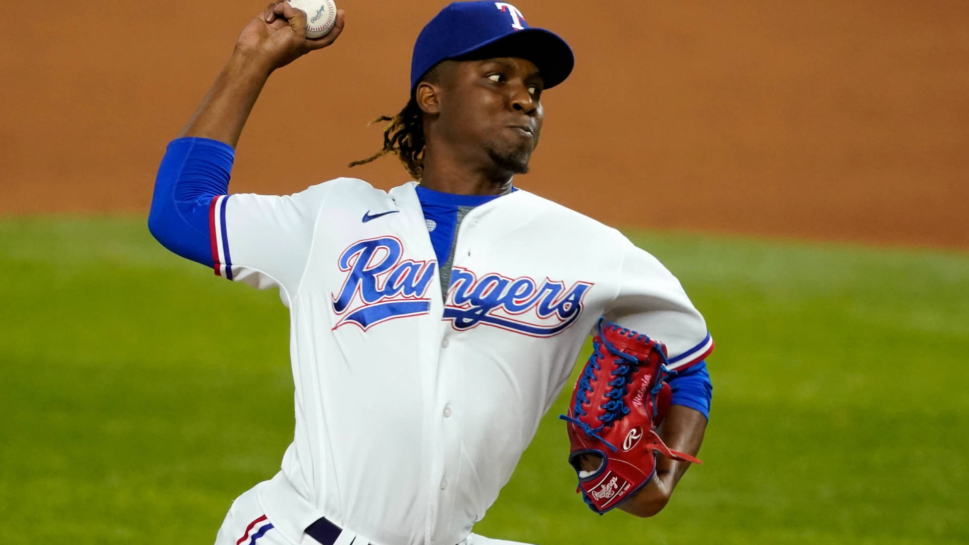 Rafael Montero In Action With Red Baseball Glove Background