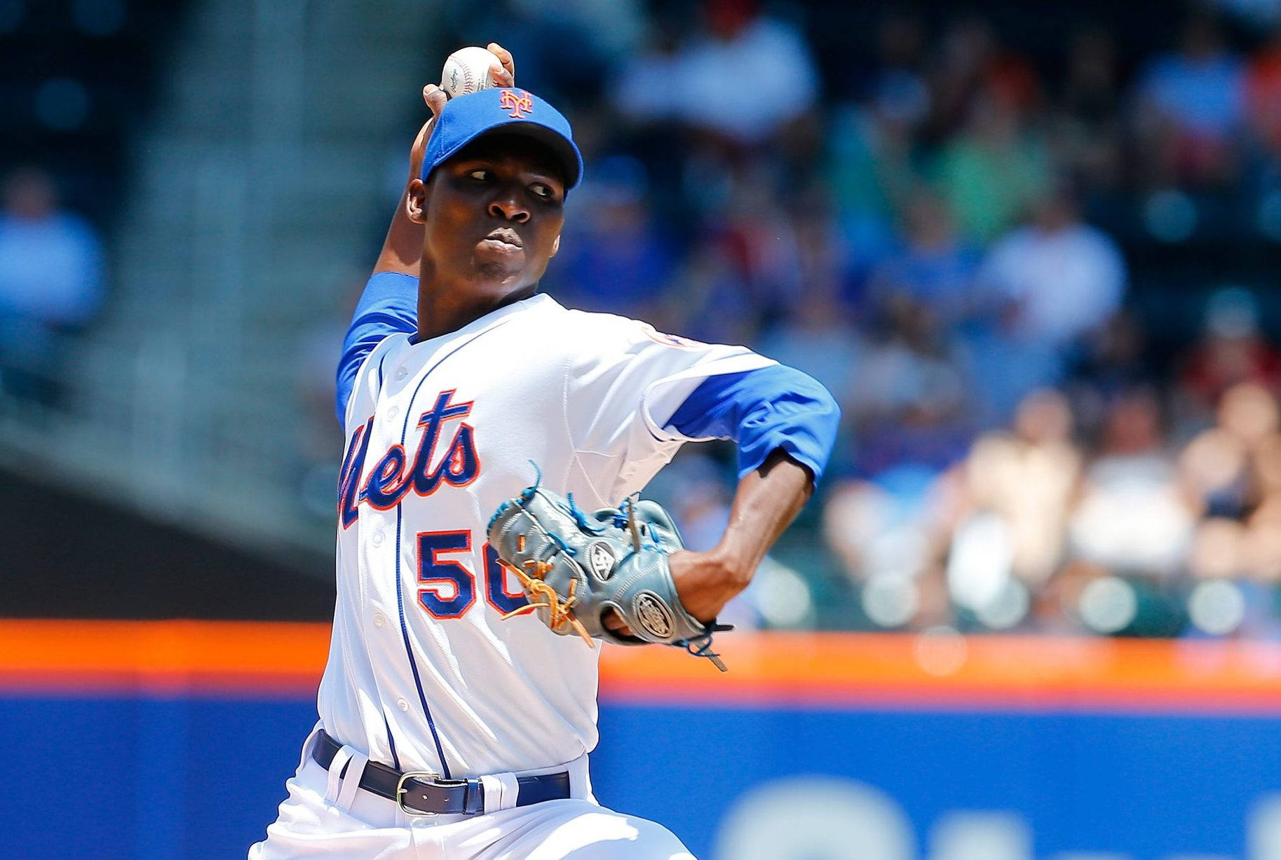 Rafael Montero Pitching On Sunny Day Background