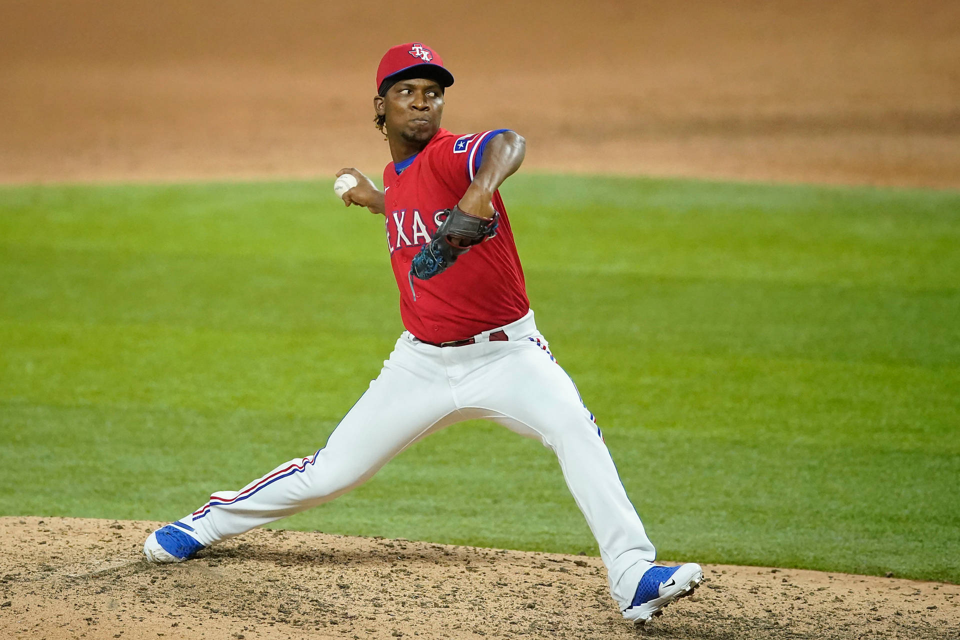 Rafael Montero Wearing Red Uniform Background