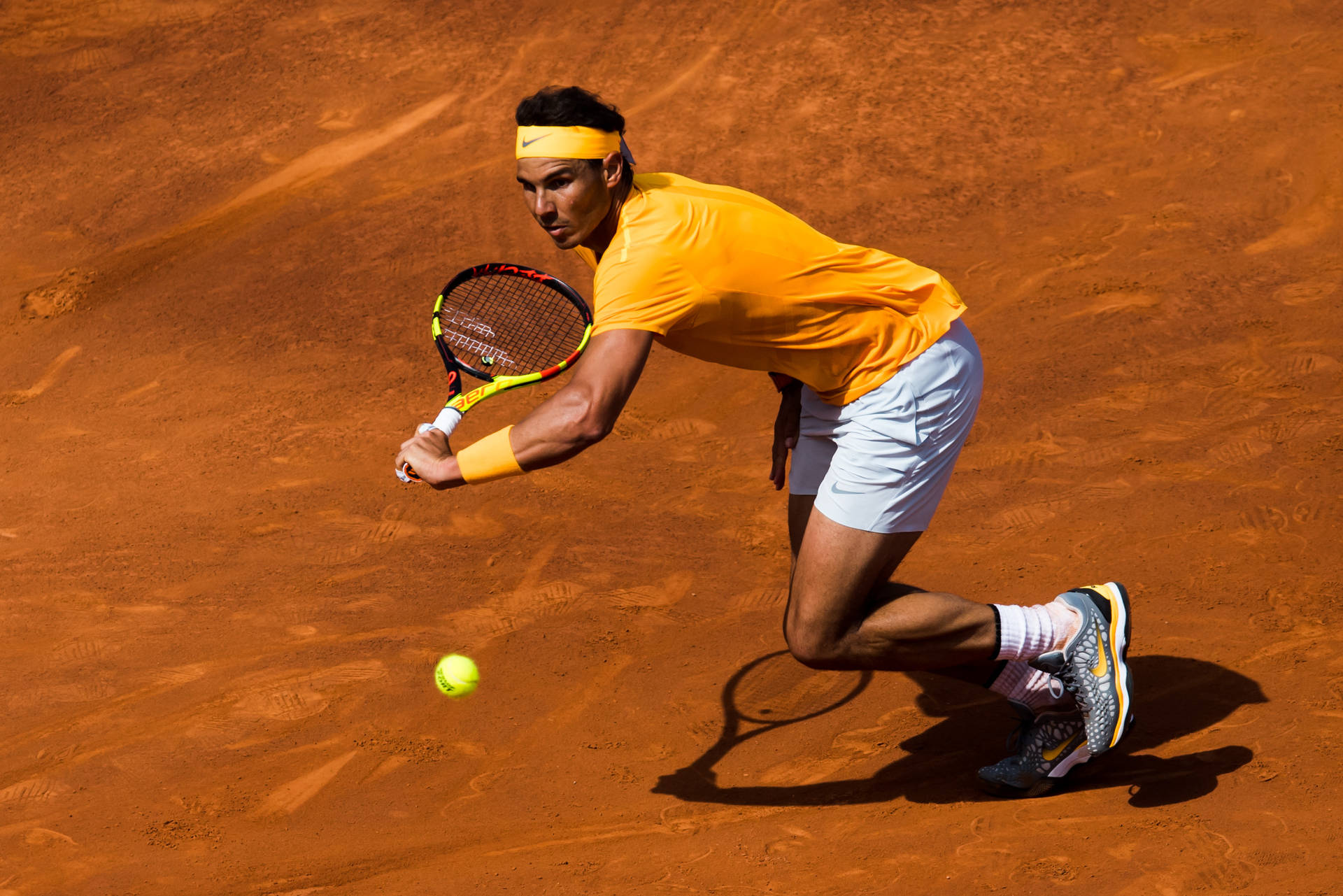 Rafael Nadal Playing Tennis Background