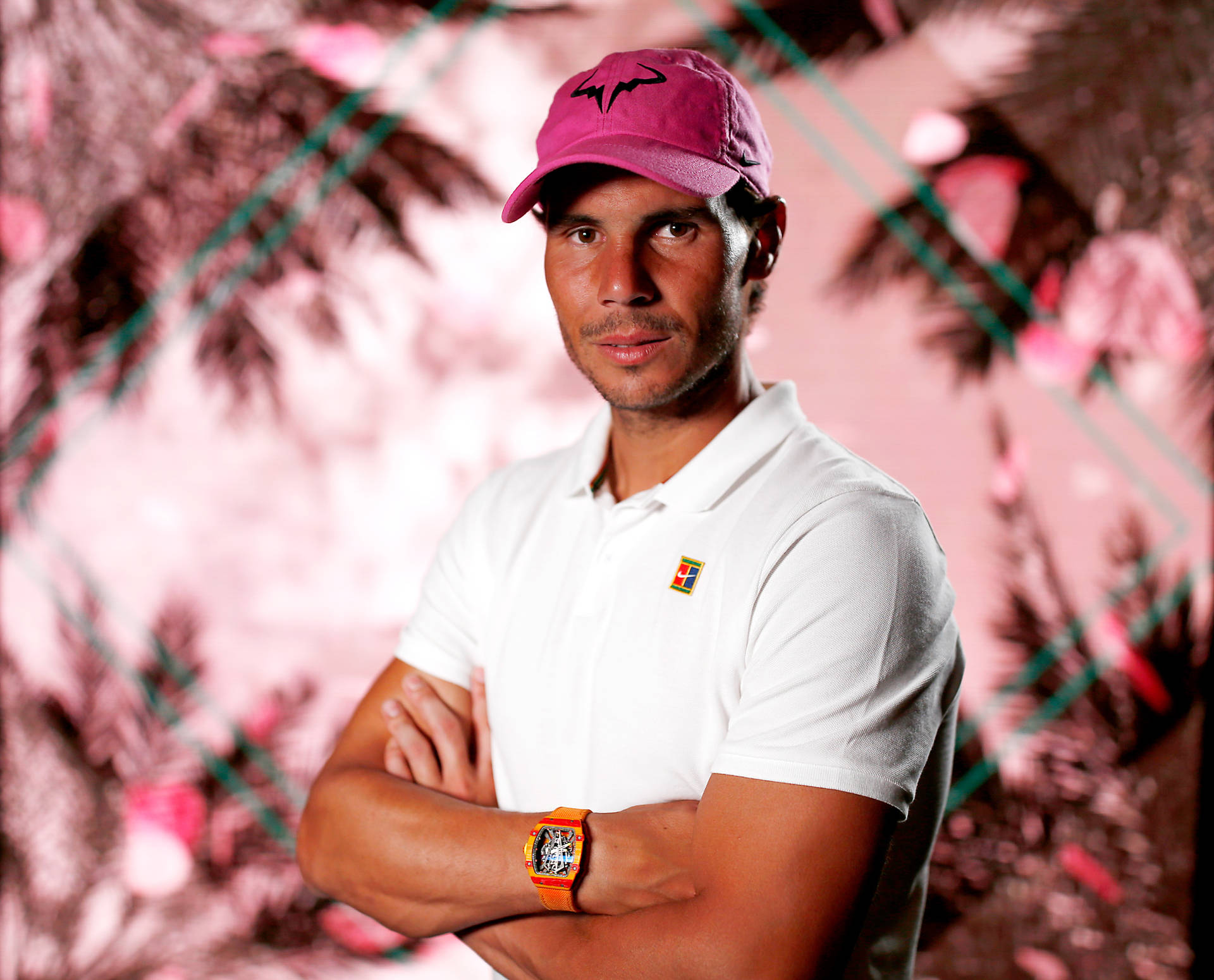 Rafael Nadal Posing With Cap Background