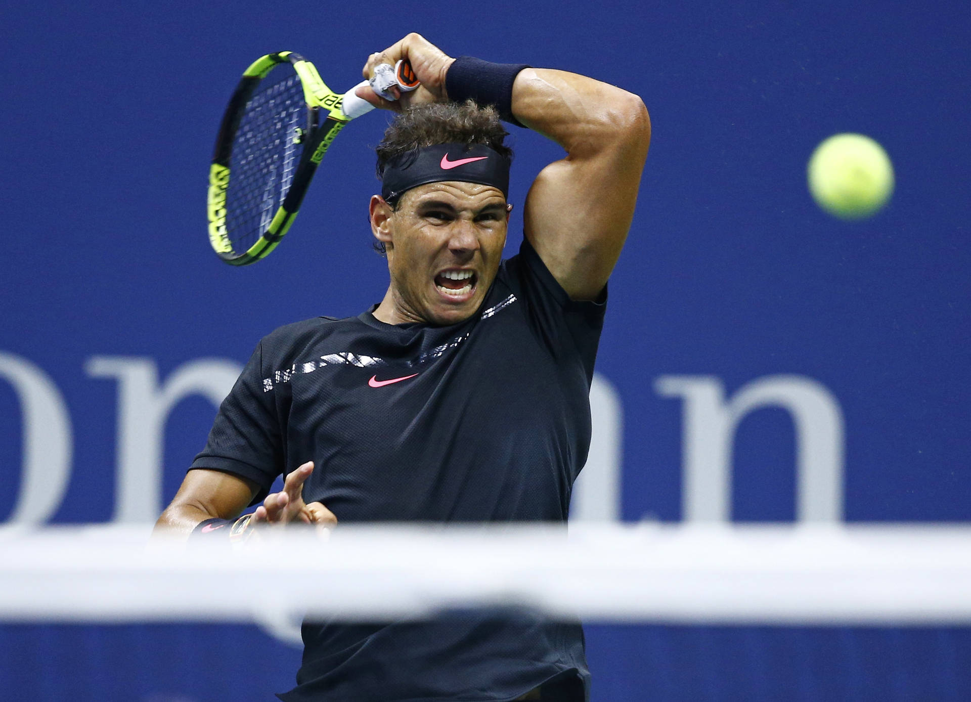 Rafael Nadal Swinging His Racket Background